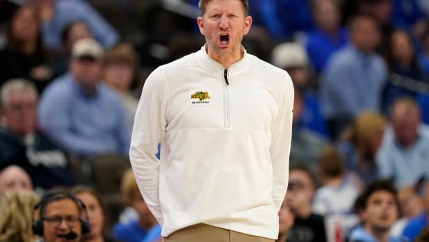 North Dakota State head coach David Richman reacts on the bench during the second half of an NCAA college basketball game against Creighton, Saturday, Nov. 11, 2023, in Omaha, Neb. Creighton won 89-60. (AP Photo/Charlie Neibergall)   